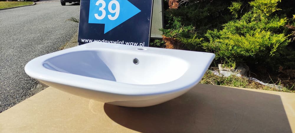 Umywalka wisząca Roca Nexo 60cm z otworem i przelewem
