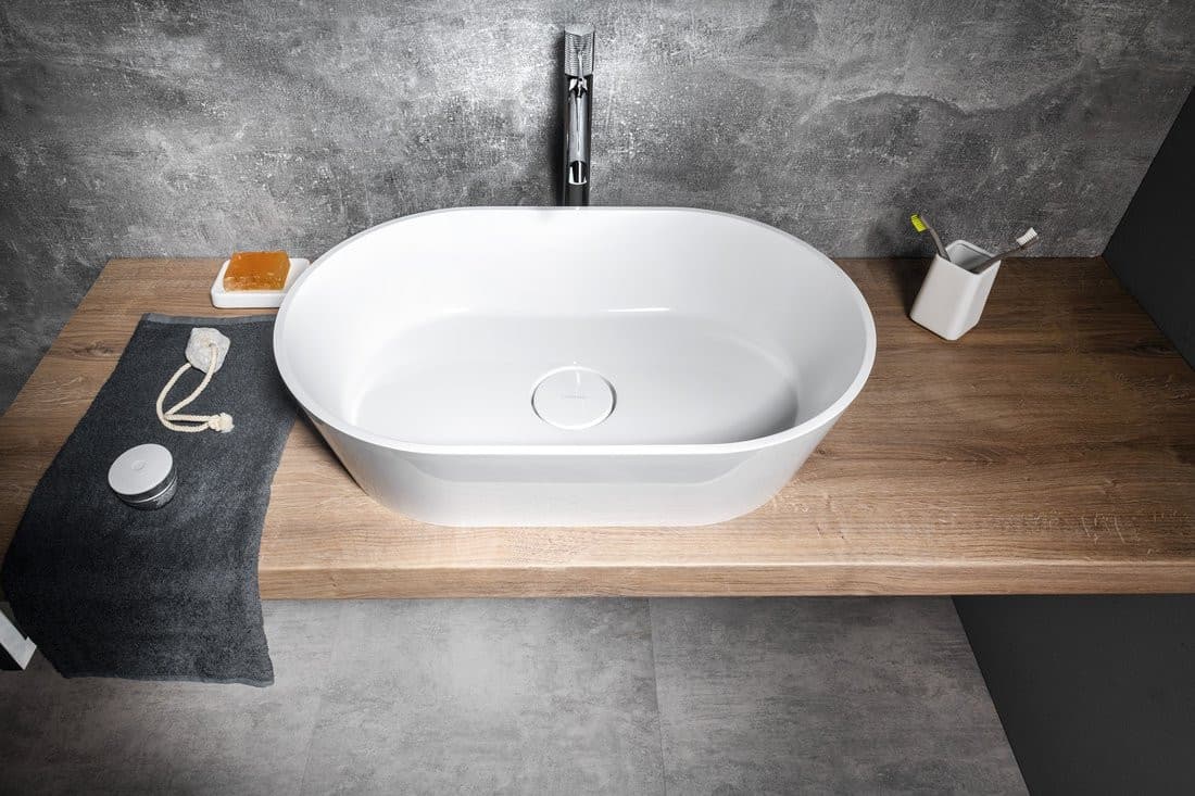 GERANO umywalka kompozytowa nablatowa z pokrywą odpływu 60x38cm, biały